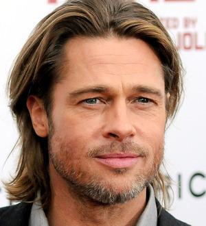 Brad Pitt tears ligament in knee?
