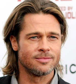Brad Pitt tears ligament in knee?