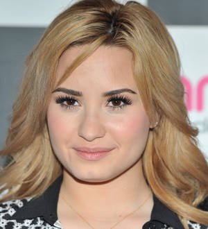 Demi Lovato battling sickness on The X Factor tour
