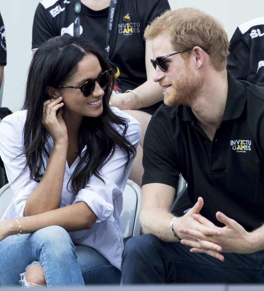 Prince Harry holds hands with Meghan Markle at Invictus Games