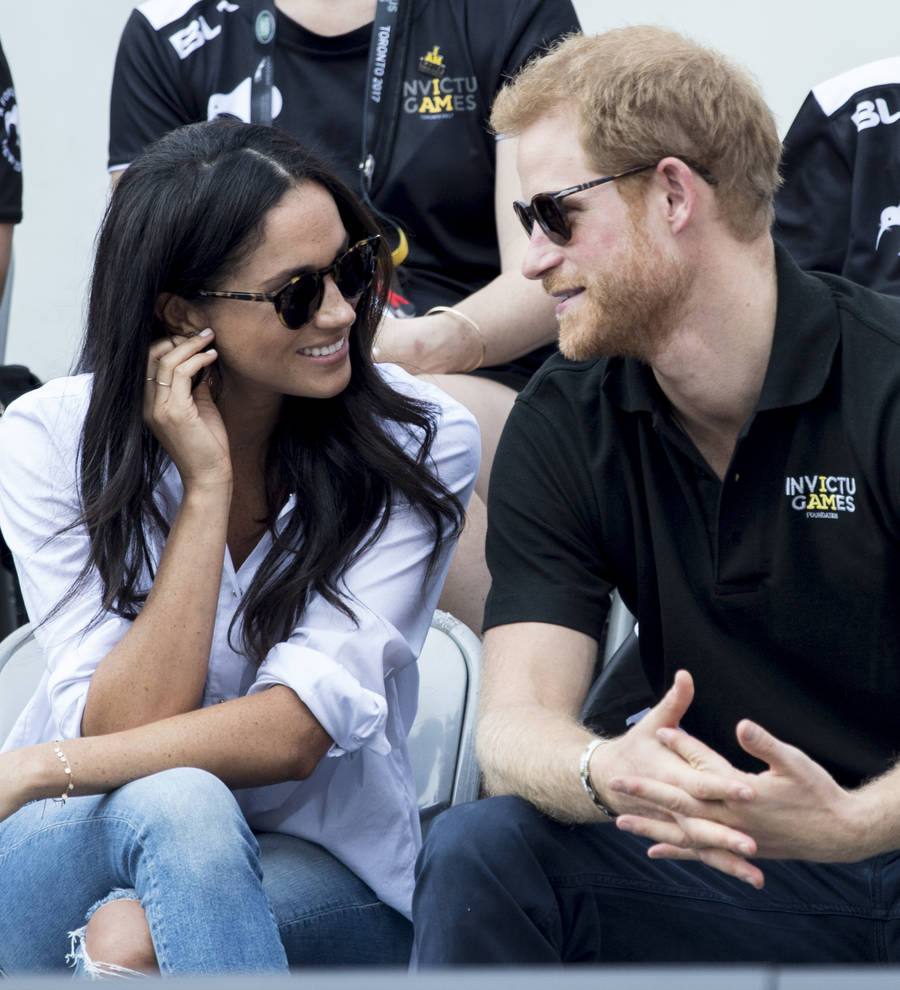 Prince Harry holds hands with Meghan Markle at Invictus Games