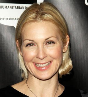 Kelly Rutherford is legally bound to be polite to kids' father