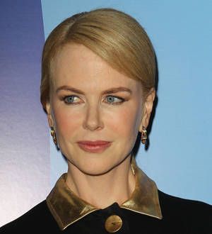 Nicole Kidman's tears turn to laughter as she visits chat show after pal's funeral