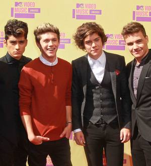 One Direction land Michael Jackson's bodyguard
