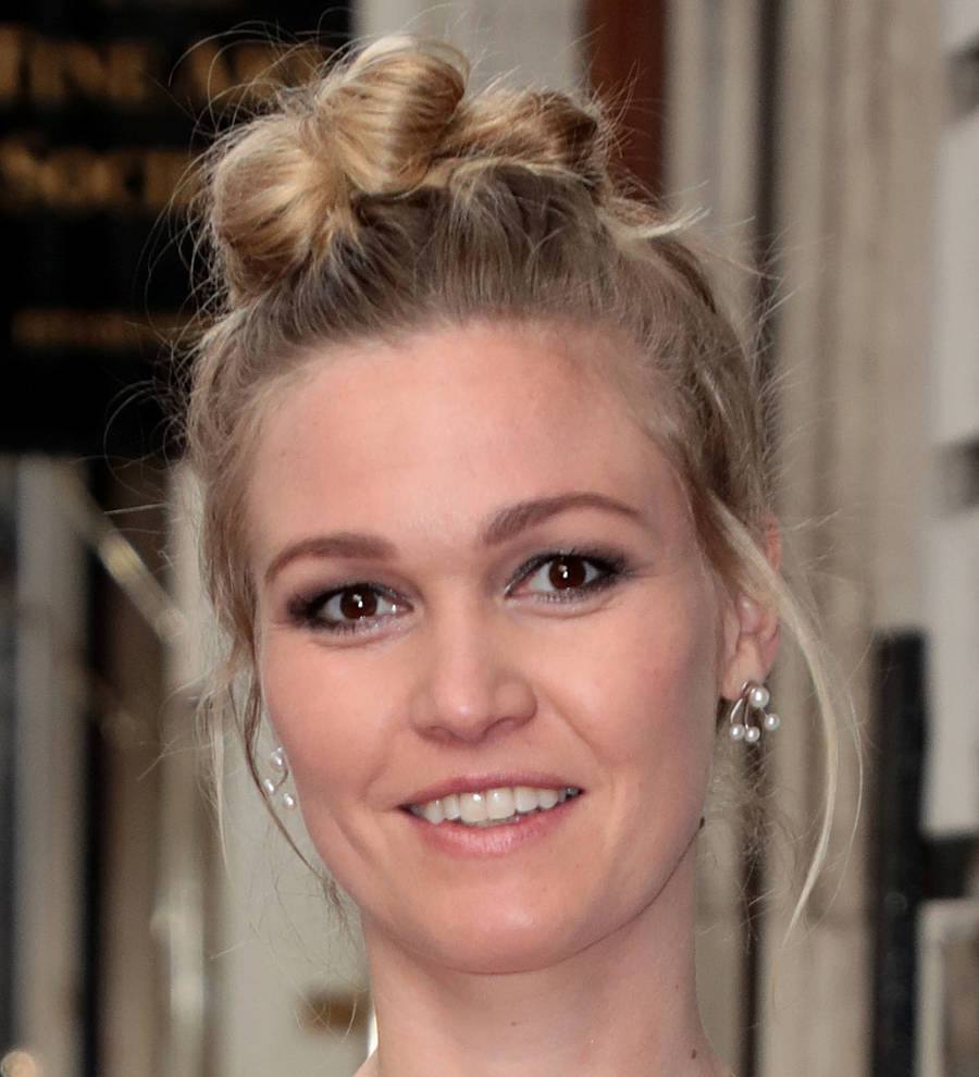 Julia Stiles shows off baby boy three weeks after birth