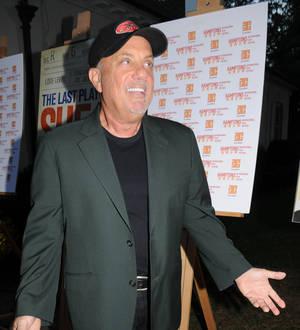 Billy Joel thrills high school students with unannounced assembly show
