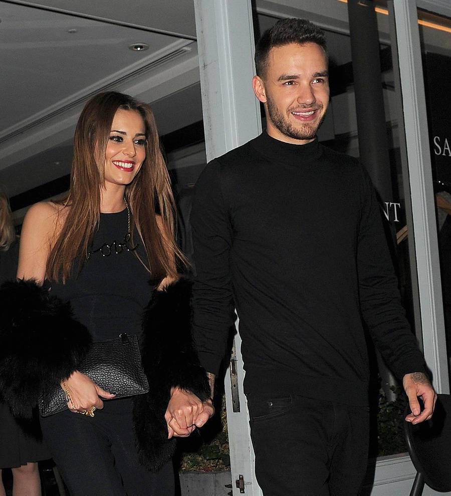 Liam Payne's girlfriend Cheryl embraces baby rumors by showing off growing belly