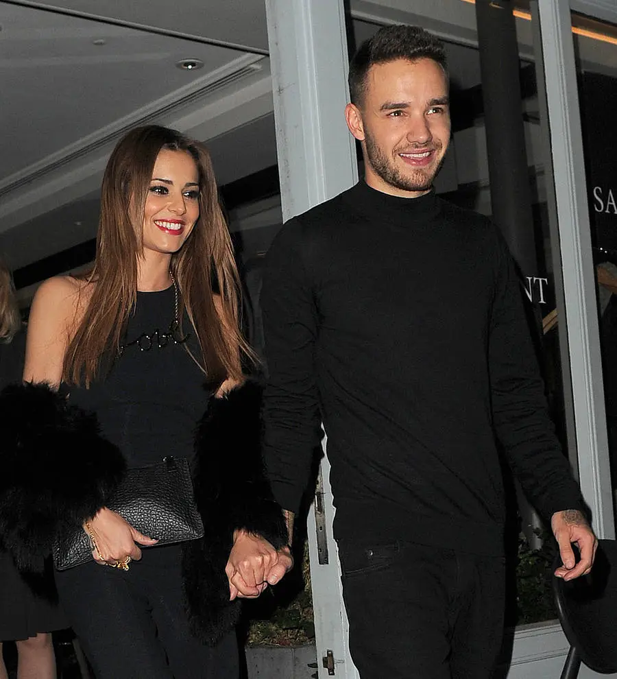 Liam Payne's girlfriend Cheryl embraces baby rumors by showing off growing belly