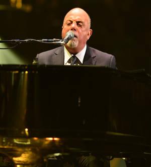Billy Joel rocks out with Brian Johnson
