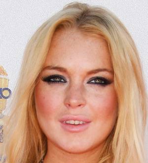 Lindsay Lohan's Dad Hopeful for Star's Future After Jamie Lee Curtis Encounter