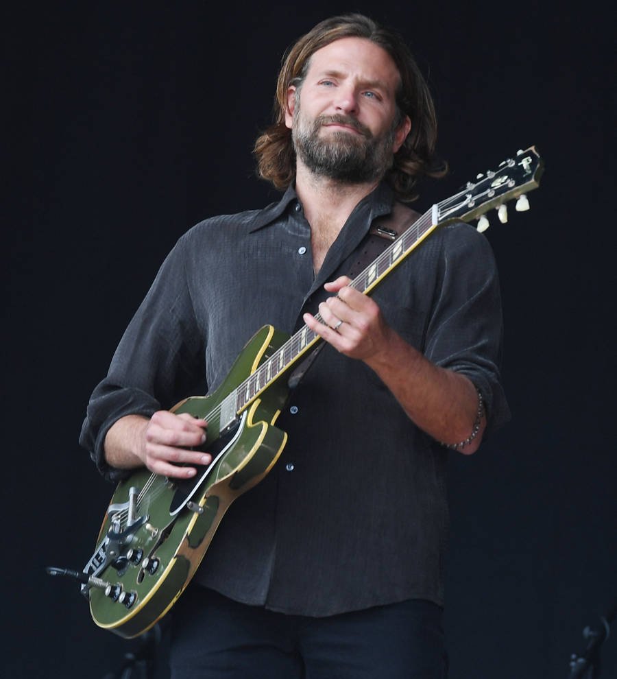 Bradley Cooper and Johnny Depp gatecrash Kris Kristofferson's Glastonbury set