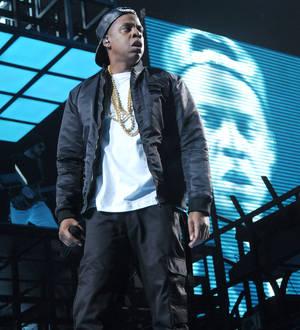 Jay Z and Chris Martin take London Underground to gig