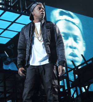 Jay Z and Chris Martin take London Underground to gig