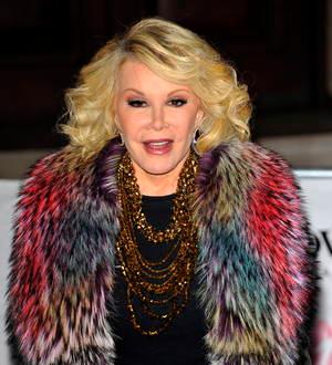 Joan Rivers presides over pals' wedding