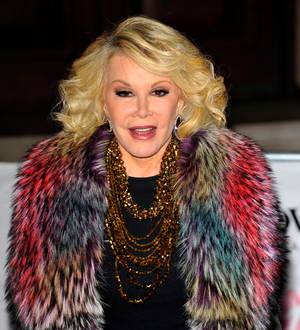 Joan Rivers presides over pals' wedding