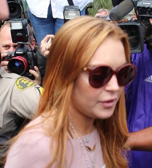 Lindsay Lohan escapes prosecution in New York club brawl