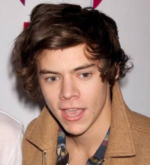 Harry Styles strips off for Segway spin