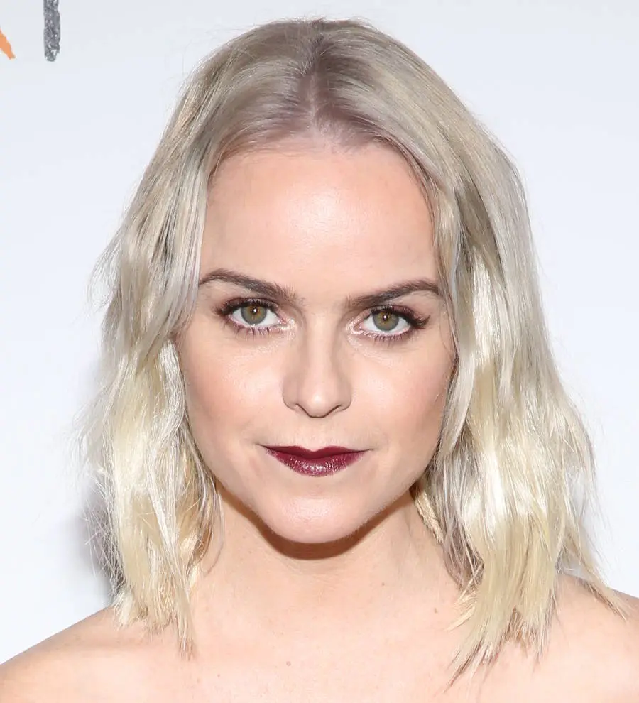 Taryn Manning rocks out with Def Leppard star