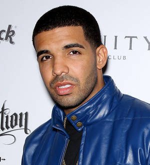 Drake trips over Rihanna's gown backstage at MTV VMAs