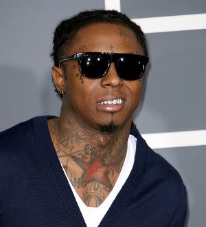 Lil Wayne settles tax debt