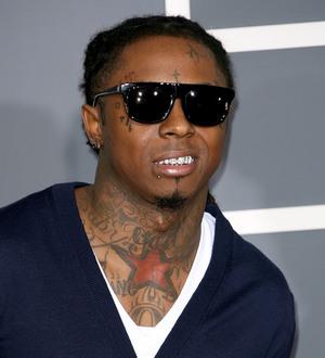 Lil Wayne settles tax debt
