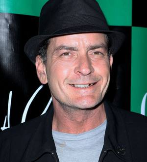 Richards sad to see Kutcher take Sheen's job