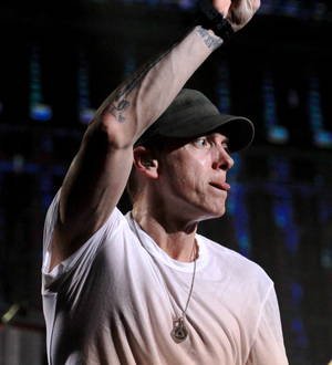 Jealous Eminem tempted to slam Kanye West and Lil Wayne in songs