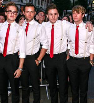 McFly brave the rain to give free concert for Christmas shoppers