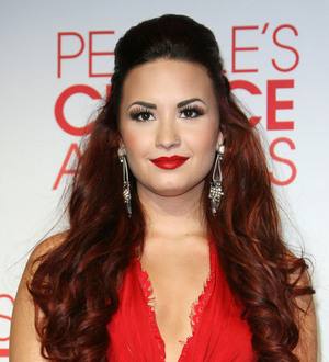 Demi Lovato brushes off rehab rumours