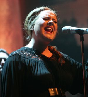 Adele wants free gig-goers to pay charity cash