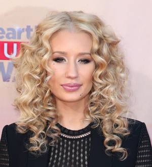 Iggy Azalea taking singing lessons