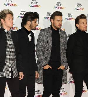 One Direction determined to continue as four-piece