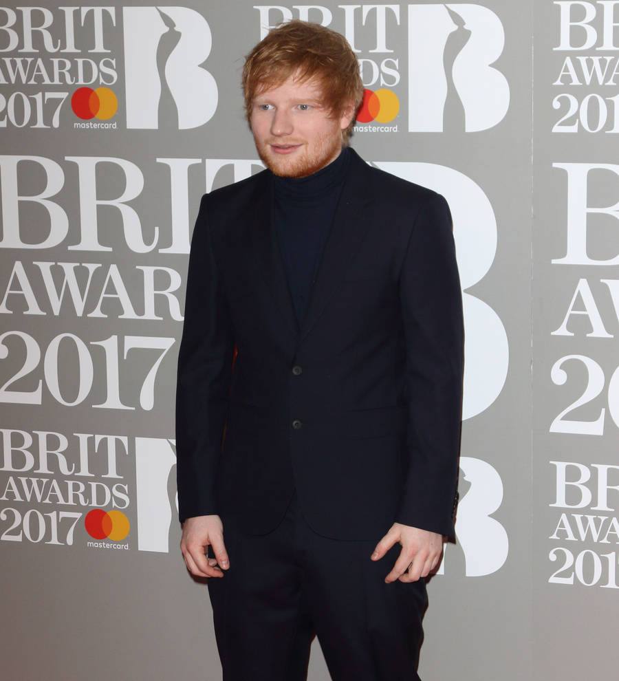 Ed Sheeran turns shop worker to sell new album