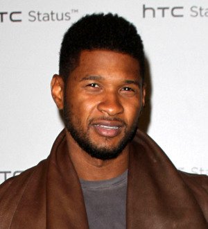 Usher suffers wardrobe malfunction at Clinton concert