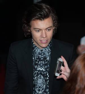 Harry Styles caught short at the BRIT Awards as One Direction win big prize