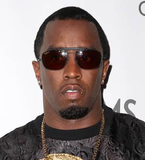 Sean 'Diddy' Combs dressed as Easter Bunny for his kids