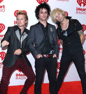 Green Day resume tour with triumphant arena return