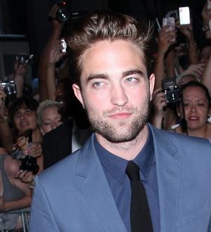 Robert Pattinson disassociates himself from tabloid stories