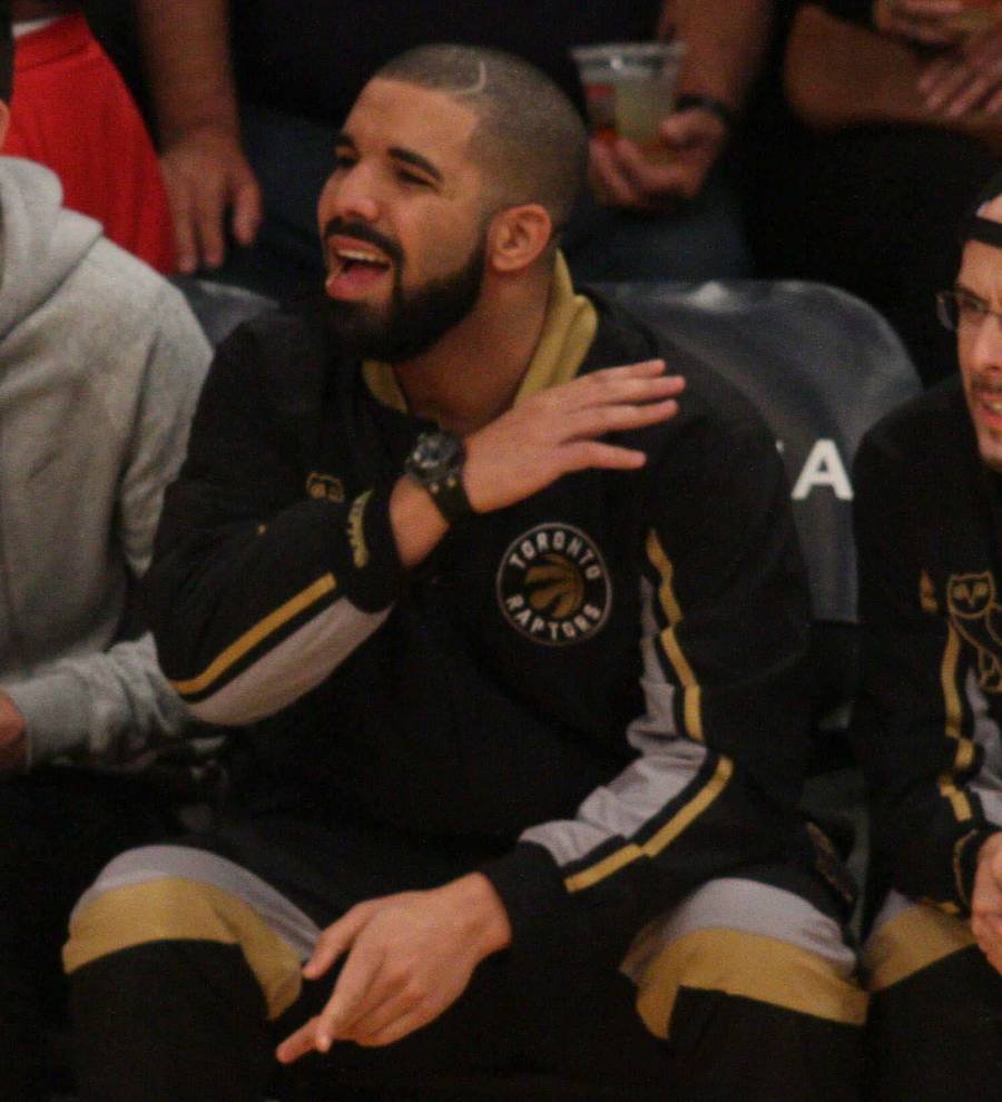 Drake works as basketball touchline reporter at Toronto Raptors game