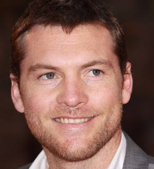 Sam Worthington proud of his paunch