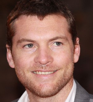 Sam Worthington proud of his paunch