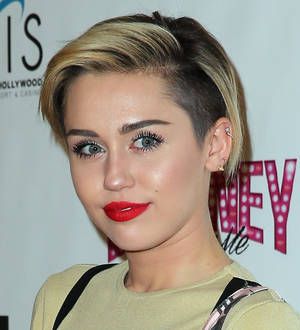 Miley Cyrus struggling with stomach flu