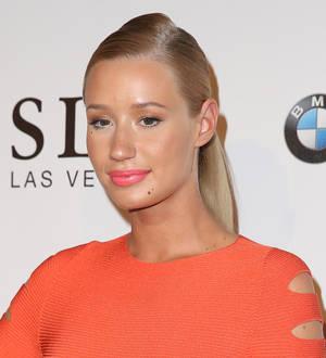 Iggy Azalea falls offstage at MTV VMA's benefit
