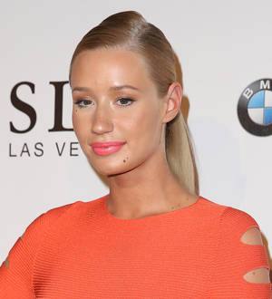 Iggy Azalea falls offstage at MTV VMA's benefit