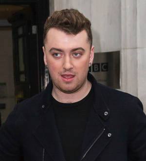 Sam Smith debuts new boyfriend in vacation photos