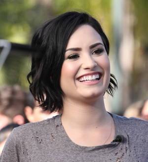 Wilmer Valderrama surprises Demi Lovato at charity concert