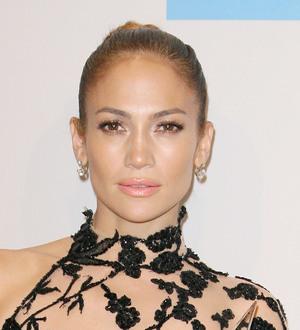 Jennifer Lopez and Casper Smart cuddle up on romantic beach vacation