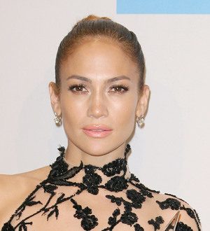 Jennifer Lopez and Casper Smart cuddle up on romantic beach vacation