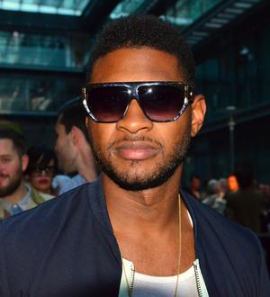 Usher's stepson declared brain dead - report