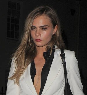 Michelle Rodriguez pictured kissing Cara Delevingne